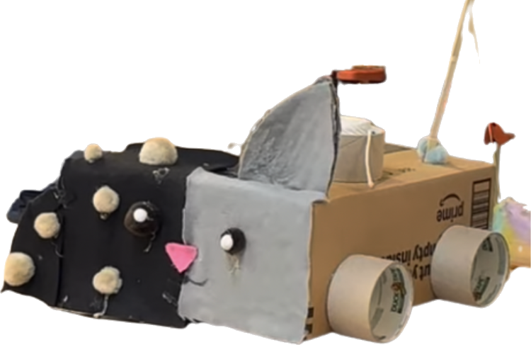Cardboard cat-shaped shelter enrichment prototype